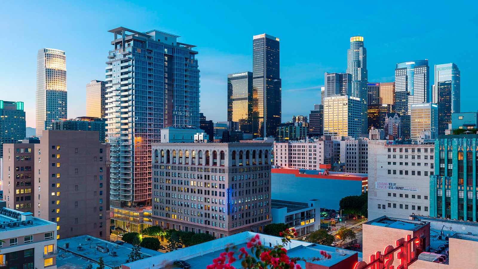 Downtown Los Angeles skyline with high rise buildings at dusk