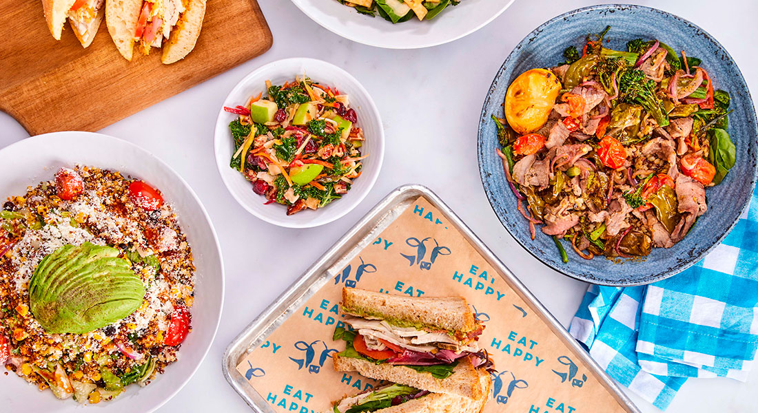 Top down view of sandwiches, salads and soups from Mendocino Farms.